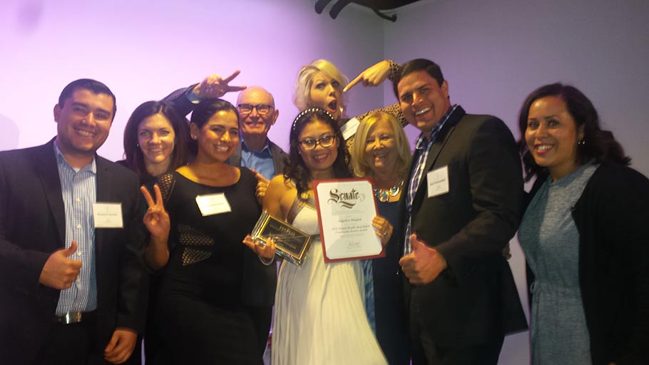 Jamboree staff, partners and resident, Angelica Sinajon, MHA Community Service Award nominee.